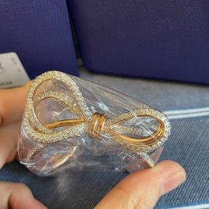 NWT Swarovski lifelong bow cuff